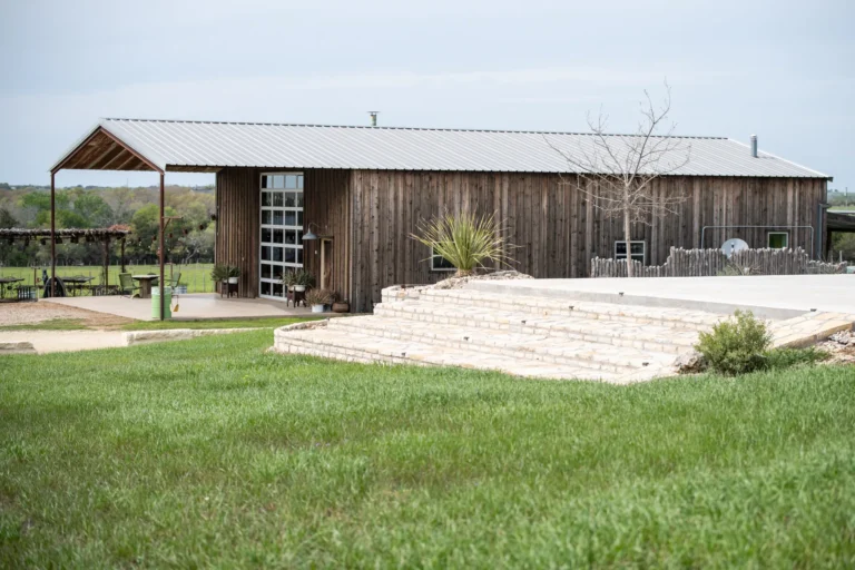 Exterior of a spacious rustic lodge at 3 Shy Ranch, offering a better lodging alternative for families and groups visiting Tarleton State University.